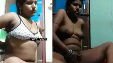 Unsatisfied village wife fingering pussy in horniness